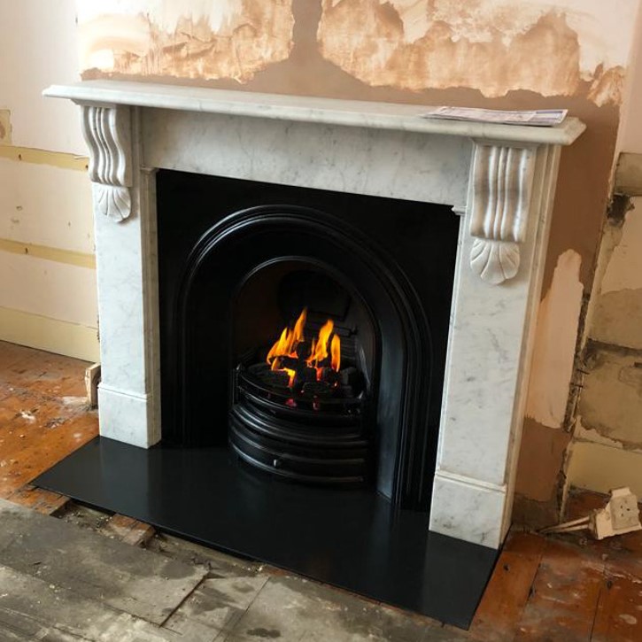 Carrara marble "Corbel" mantel, arch insert, gas fire